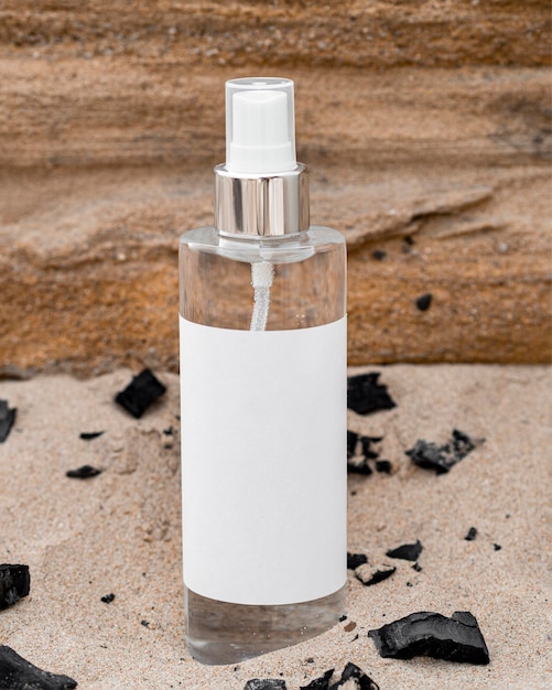 Skin care product in sand