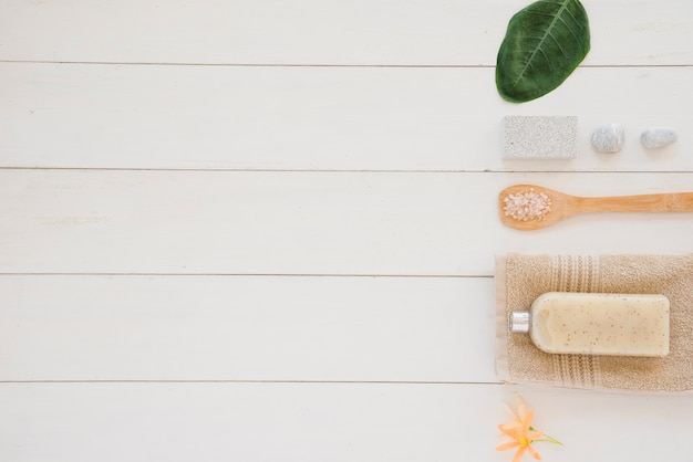 Skin care products placed in row on white surface