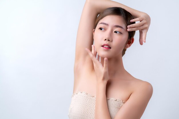 Skincare and makeup concept beautiful asian female woman with healthy facial skin close up portrait studio shot