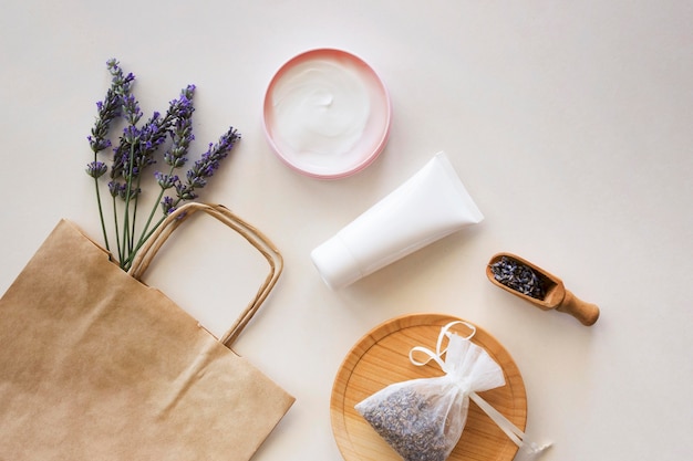 Skincare products and shopping paper bag