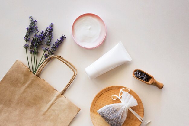 Skincare products and shopping paper bag