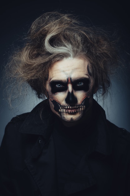 Free photo skull makeup portrait of young man