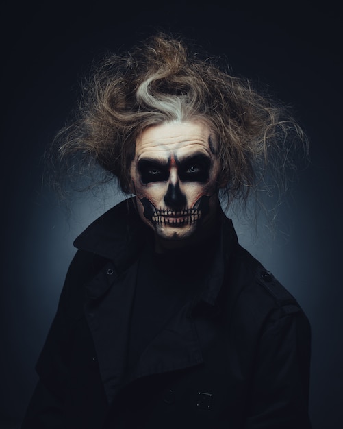 Free photo skull makeup portrait of young man