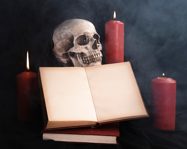 Skull with book mock-up and candles