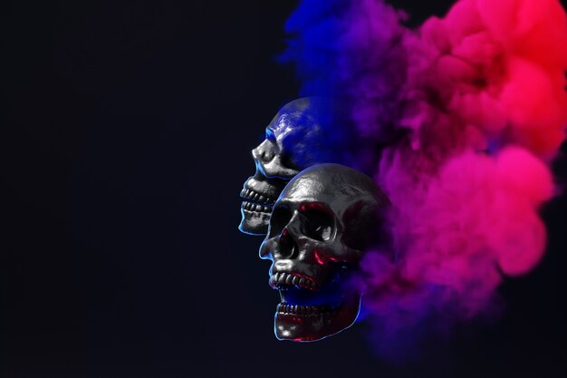 Skulls with colorful smoke in studio
