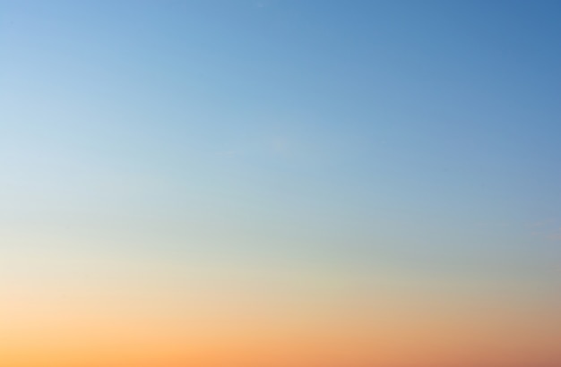 Sky background. a blue sky landscape illuminated by the light of an evening sunset - a view of the evening sky.