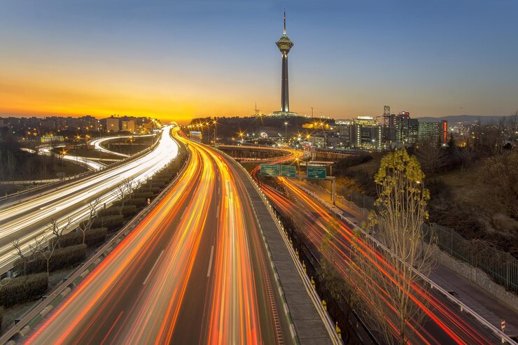 Free Photo skyline of tehran at sunset