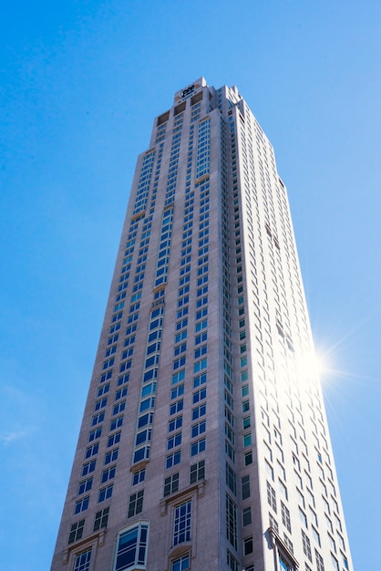 Skyscraper on blue sky background