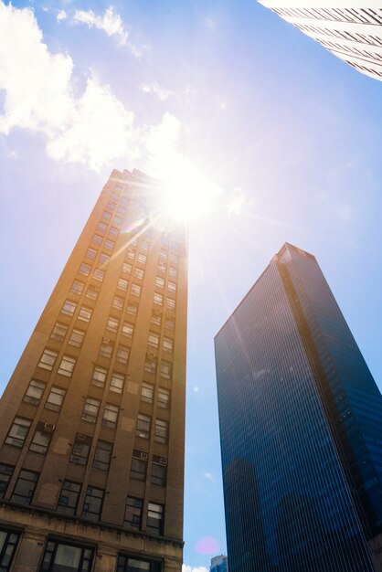 Skyscrapers from below cityscape in sunny day