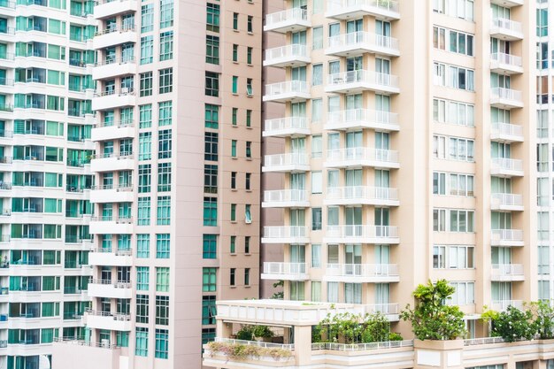 Skyscrapers with balconies and vegetation