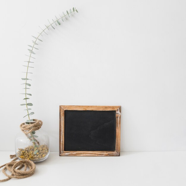 Slate next to floral decoration