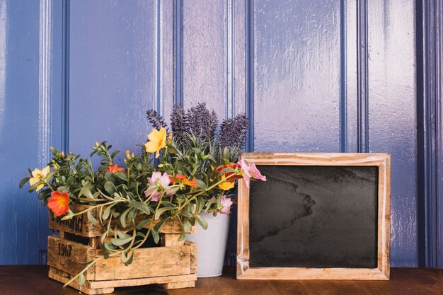 Slate next to flowers