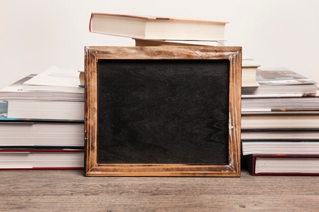 Slate framed by books