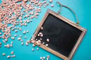 Free photo slate with himalaya salt