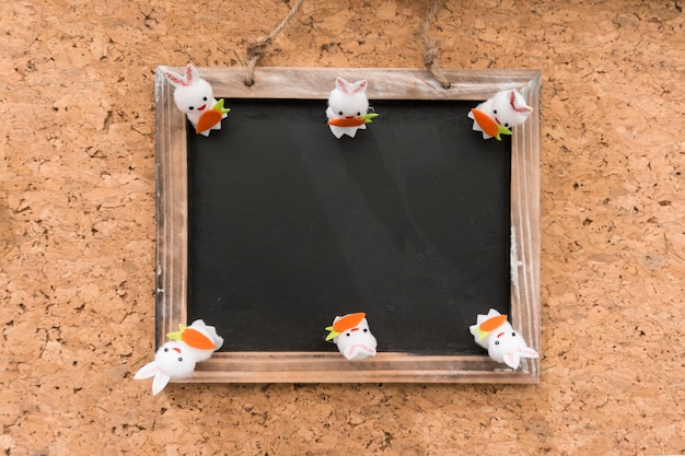 Free photo slate with six rabbits for easter day