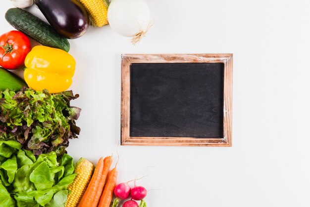 Slate with vegetables on left