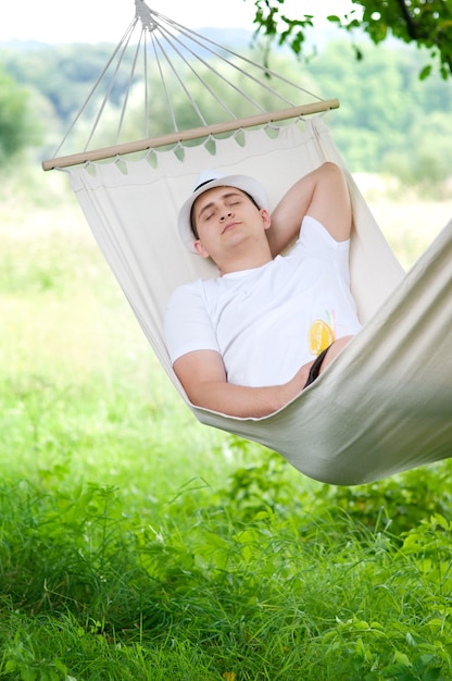 Free photo sleeping on hammock
