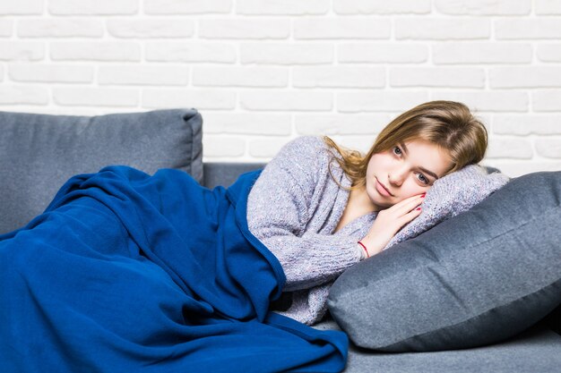 Sleeping teen girl on sofa