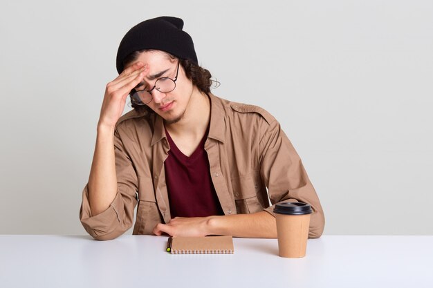 Sleepy guy with tired and exhausted facial expression