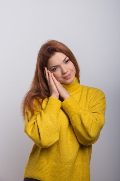 Sleepy young woman smiling