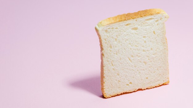 Slice of bread with color background