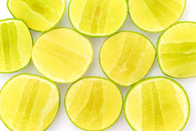 Slice of lemon on white background .