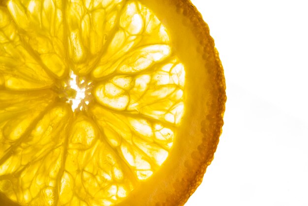 Slice of lemon with white background