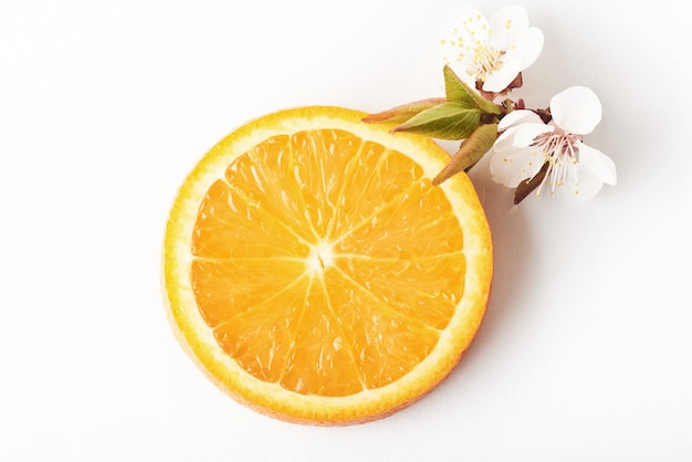 Slice ripe orange citrus fruit isolated on white.