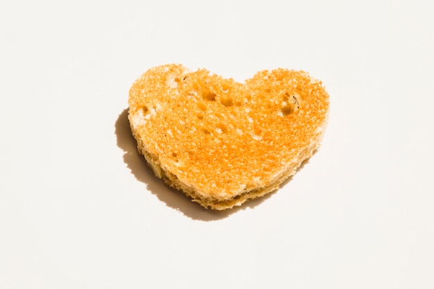 Slice of toasted bread with heart shape