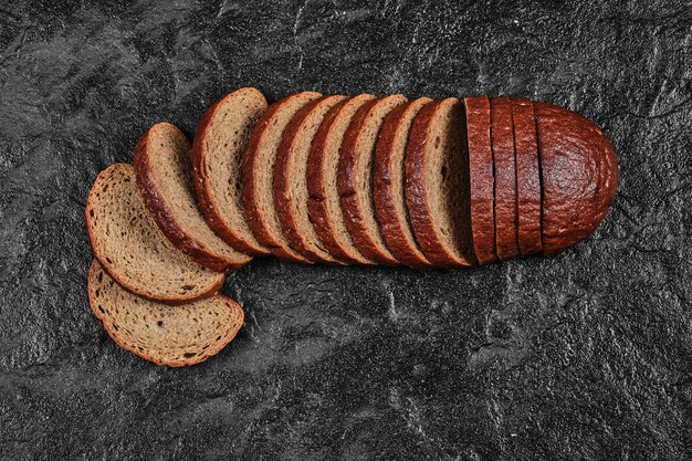 Sliced black bread.