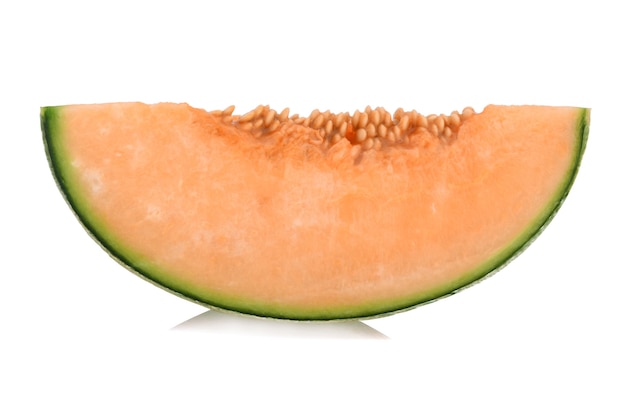 Sliced cantaloupe melon isolated on white surface