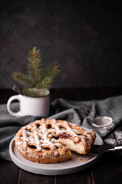 Sliced pie with pine in cup