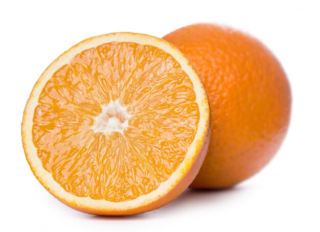 Sliced and whole oranges