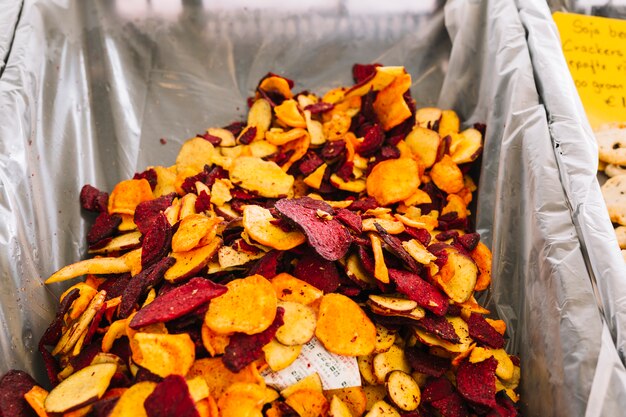 Slices of beetroot and sweet potato yam in container