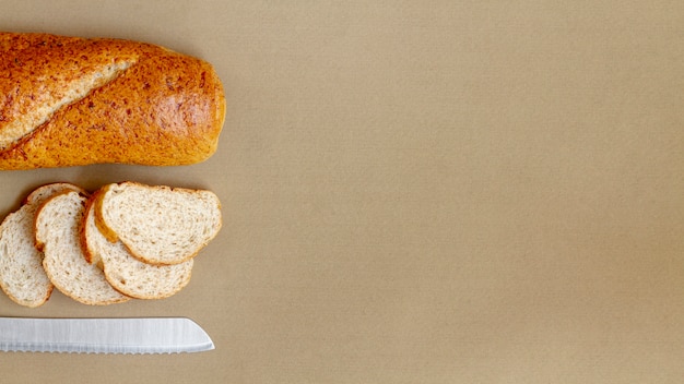 Slices of bread and knife top view