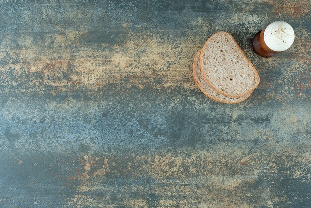 A slices of bread with boiled on marble background