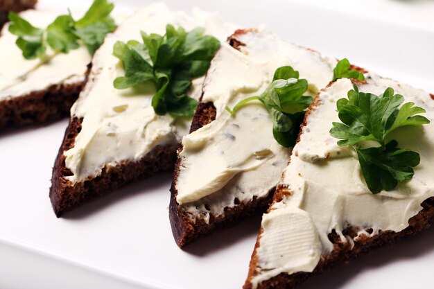 Slices of bread with cream cheese
