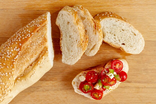 Slices of bread with cut tomatoes
