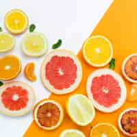 Free photo slices of citrus fruit top view