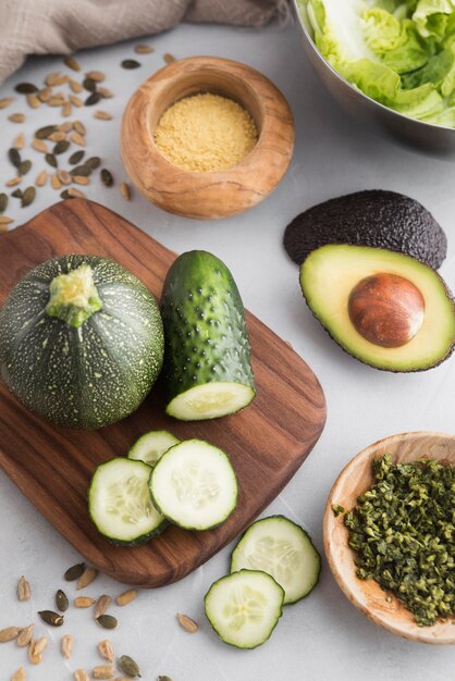 Slices of cucumber on cutting board