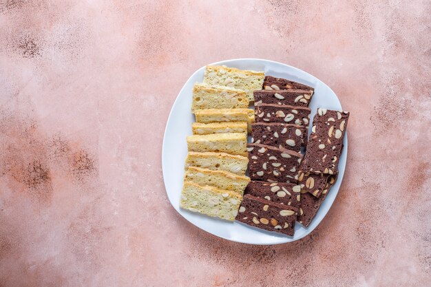 Slices of dry bread with hazelnuts.