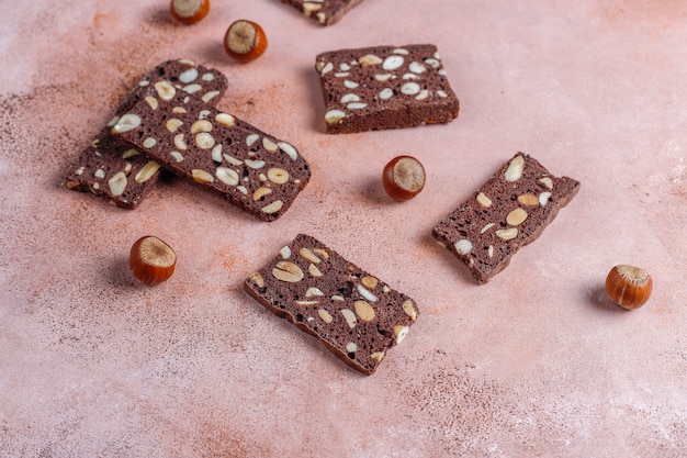 Slices of dry bread with hazelnuts.