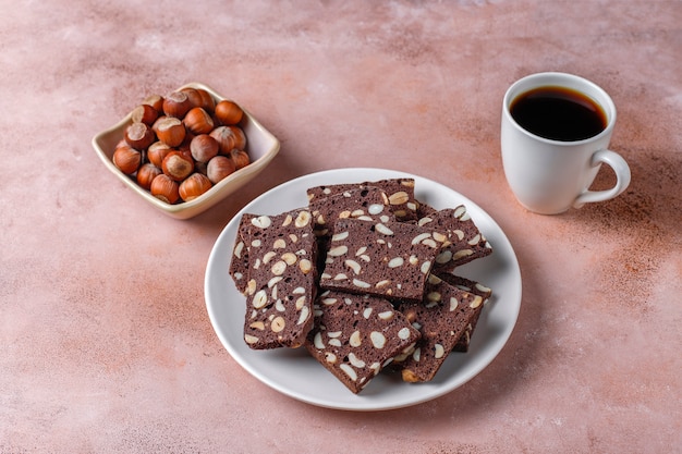 Slices of dry bread with hazelnuts.