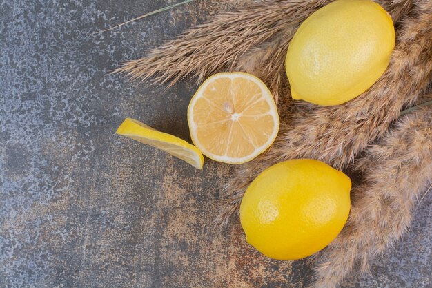 Slices of lemon on stone surface