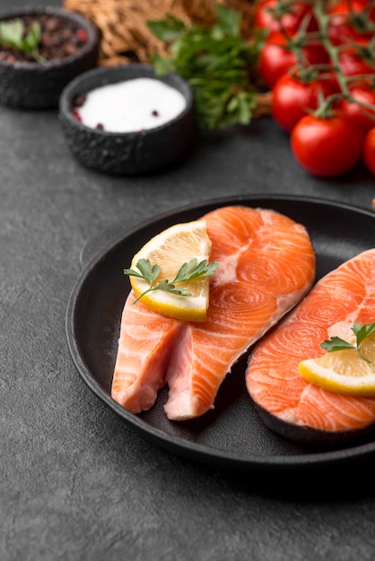 Slices of raw red salmon blurred background