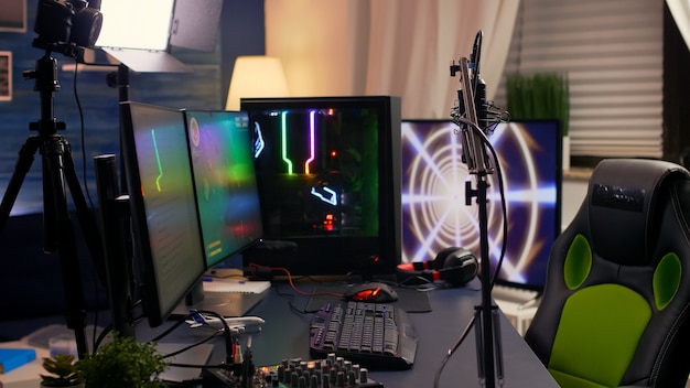 Slide view of streaming home studio equipped with professional equipment during esport competition