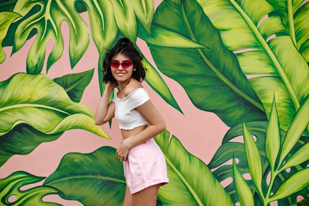 Slim woman posing in summer day