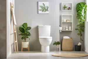 Бесплатное фото Небольшая ванная комната с современным стилем и растениями