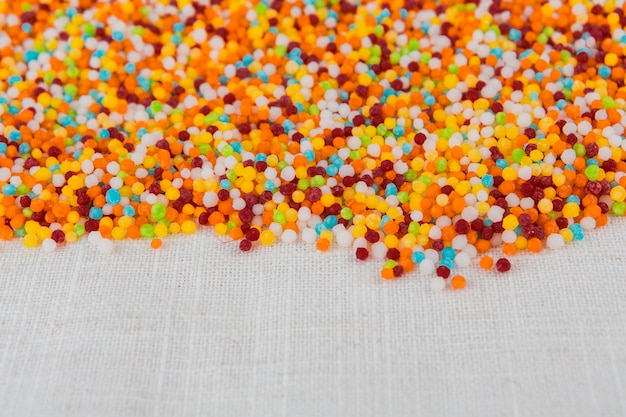 Free photo small beads scattered on table