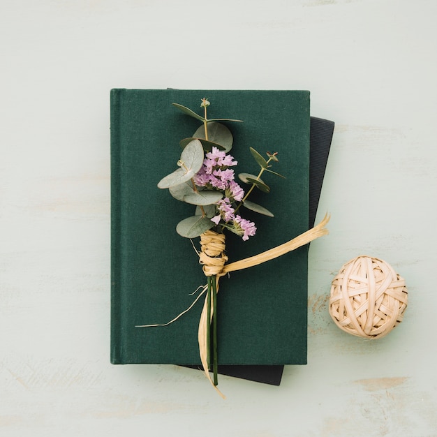 Small bouquet on books